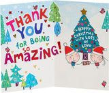 UK Greetings cartoon couple Christmas card featuring festive scene and holiday imagery, ideal for holiday greeting cards.