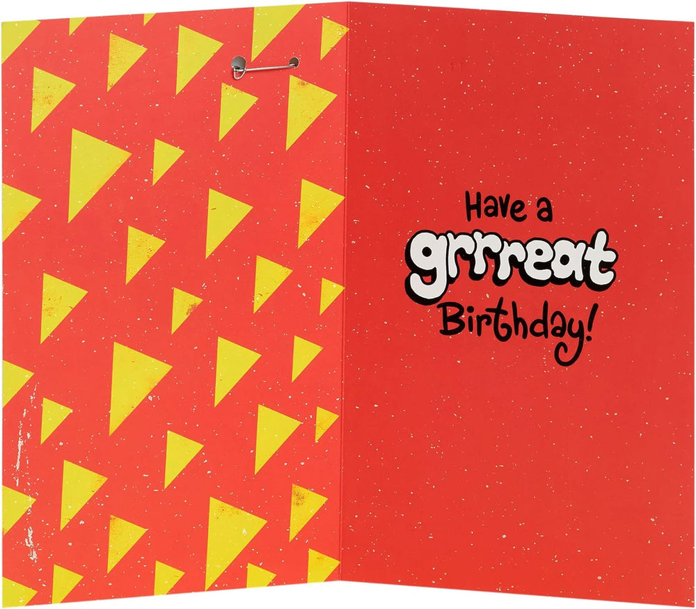 UK Greetings cartoon dog design 11th birthday greeting card with badge, featuring colorful dog illustration and celebratory elements.