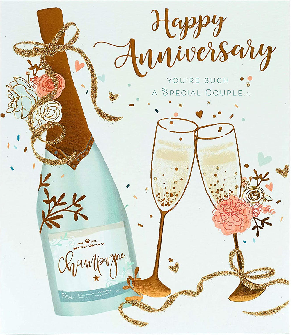 UK Greetings wedding anniversary greeting card with champagne gold foil design for couples celebrating their special day.