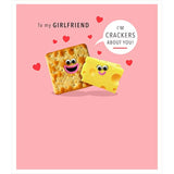 UK Greetings cheese design Valentine's Day card featuring a romantic message for a girlfriend, with playful cheese illustrations.