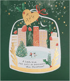 UK Greetings Christmas card for Both of You featuring a city ice rink scene, with festive holiday illustrations and winter scenery.
