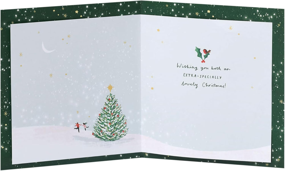UK Greetings Christmas card for Both of You featuring a city ice rink design, with festive holiday scene and winter decorations.