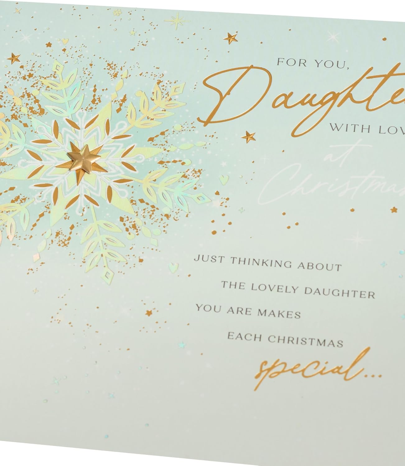 UK Greetings Christmas card for daughter featuring a snowflakes design, festive greeting card with winter-themed illustrations.