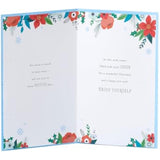 UK Greetings Christmas card for her and friend featuring a floral design, ideal for holiday greetings and festive wishes.