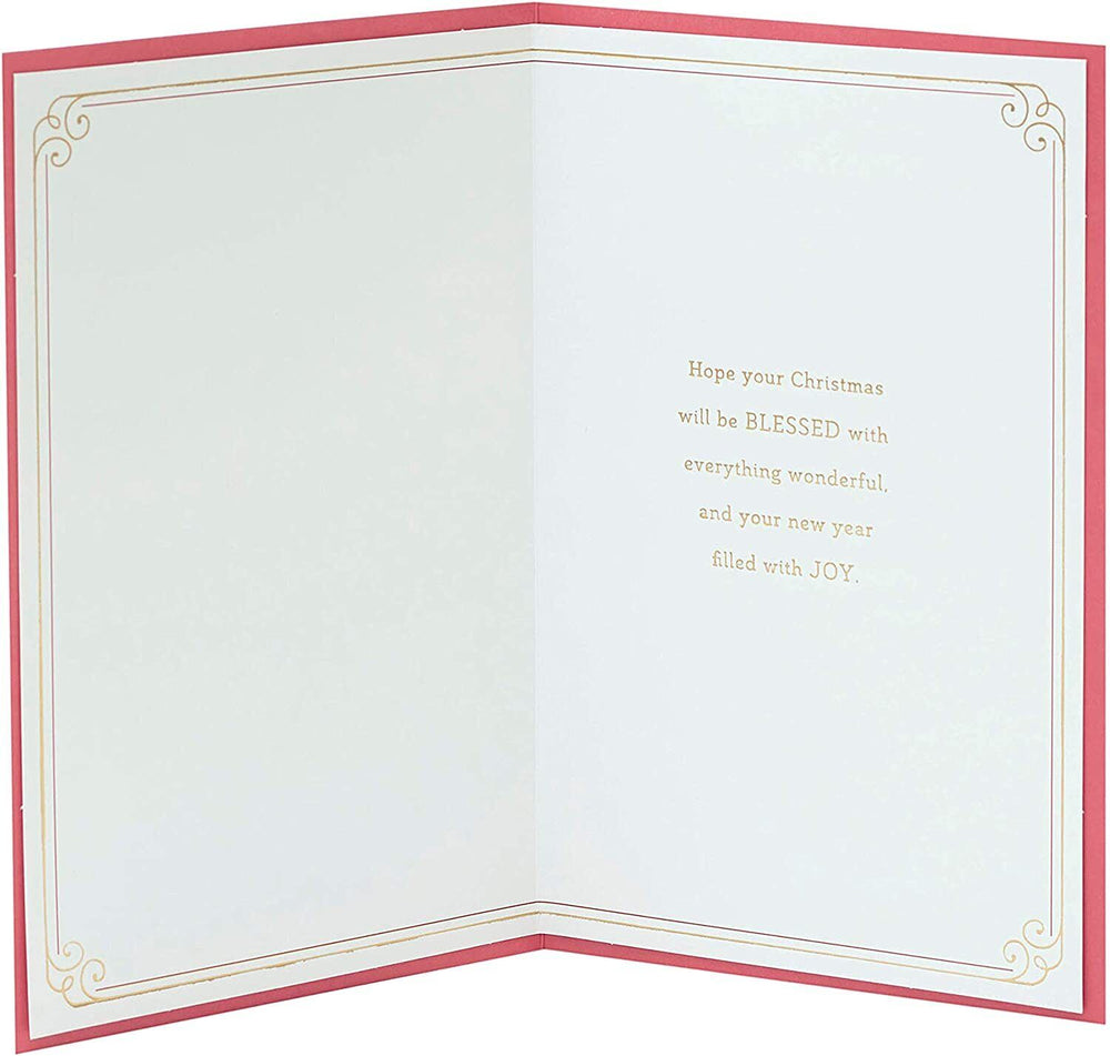 UK Greetings Christmas card featuring a peaceful religious scene for the holiday season.