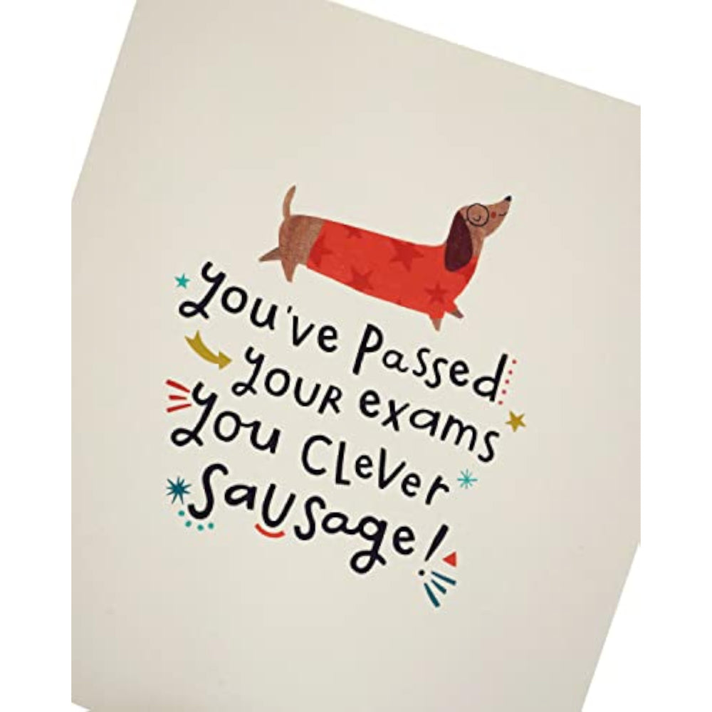 UK Greetings Clever Sausage Exams Passed congratulations card with playful sausage illustration for celebrating academic success.