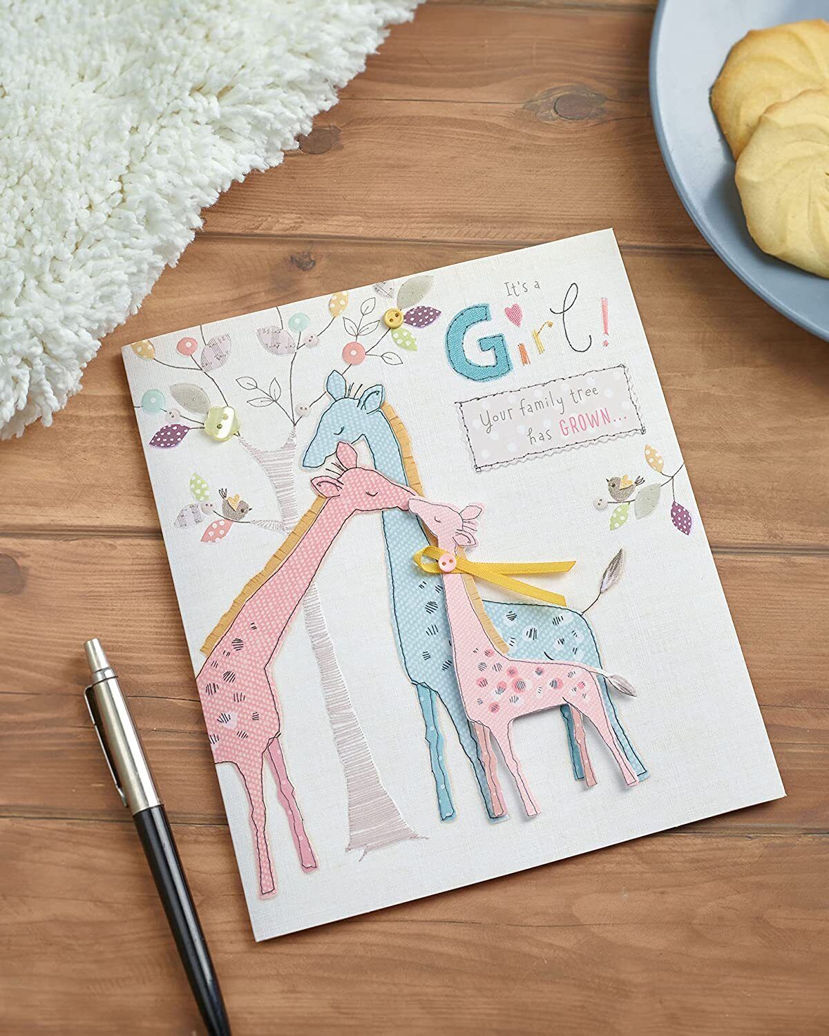 UK Greetings congratulations on new baby girl greeting card with pastel design and adorable baby girl illustration.