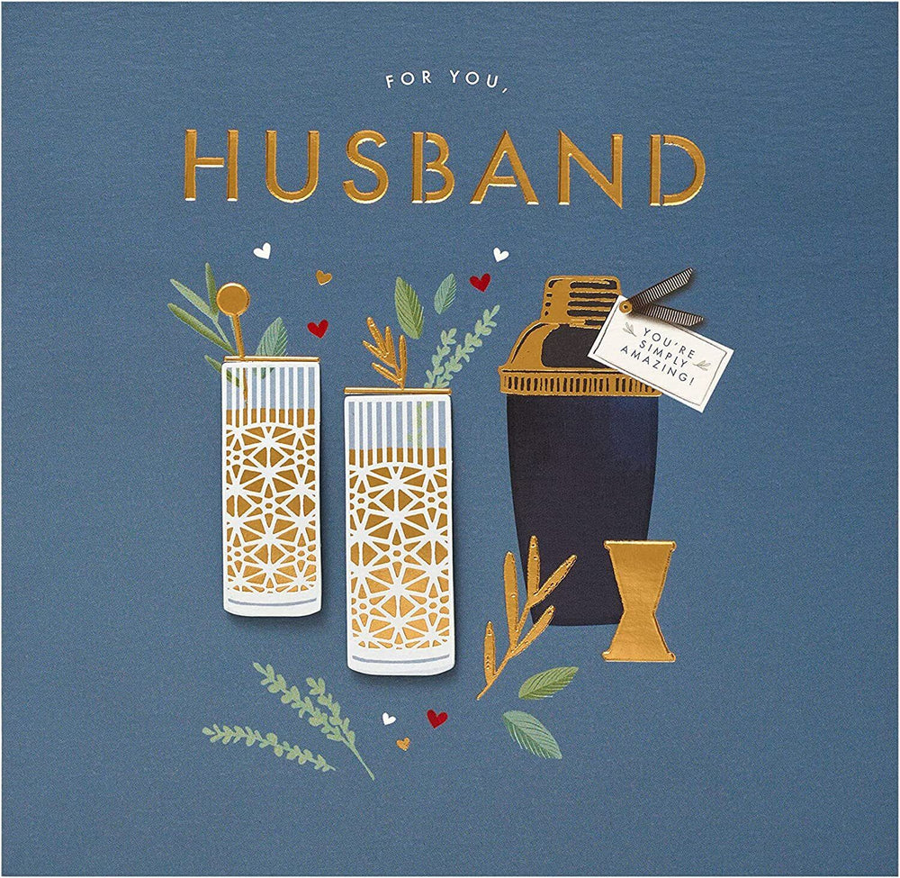 UK Greetings contemporary cocktail design birthday card for husband, featuring colorful illustrations and festive elements.