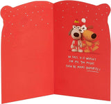 UK Greetings Christmas card featuring crackers design for brothers, festive holiday greeting card with Christmas imagery.
