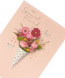 UK Greetings cute birthday card featuring a photographic floral design and colorful floral illustrations.