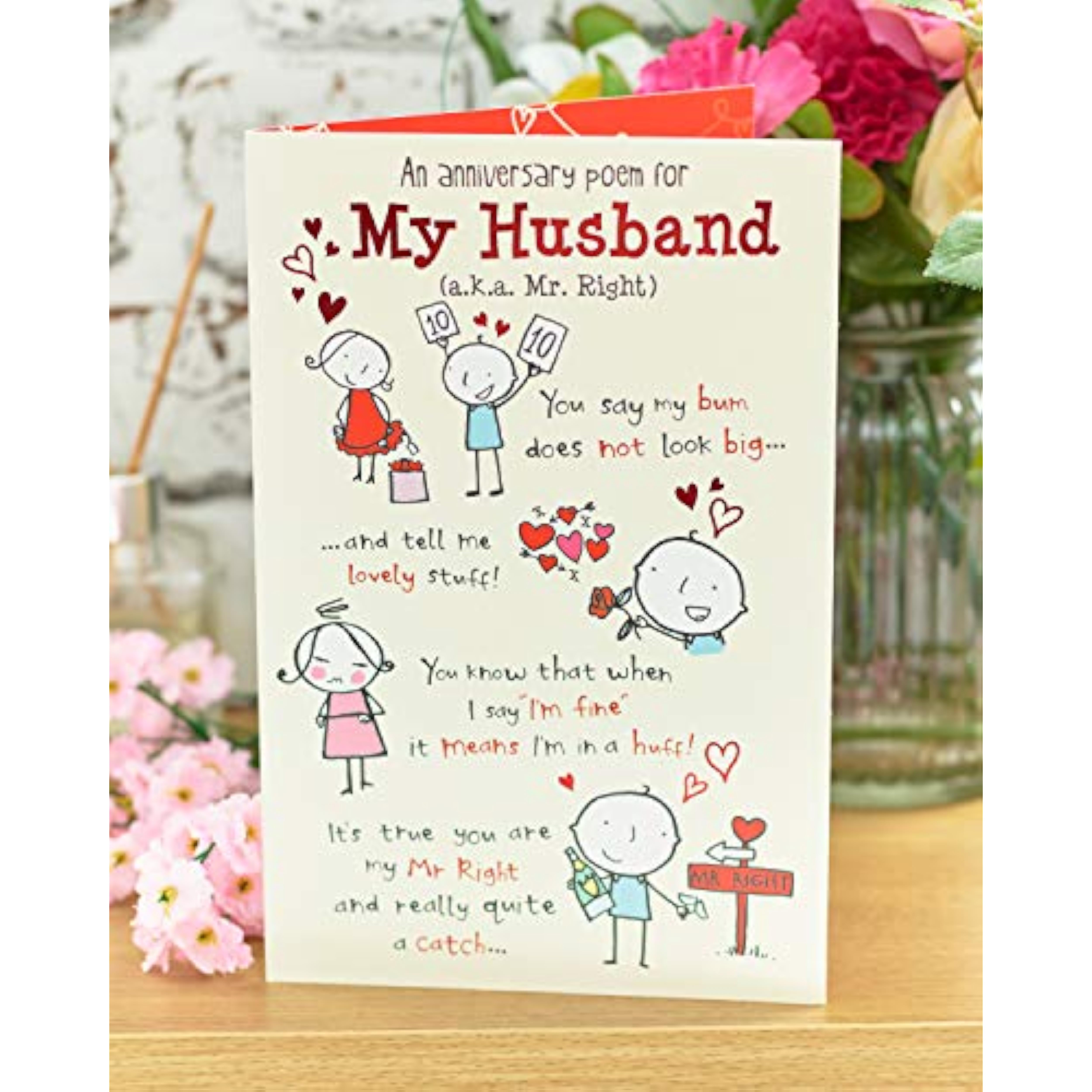 UK Greetings wedding anniversary greeting card with cute poem design for husband, featuring floral and romantic illustrations.