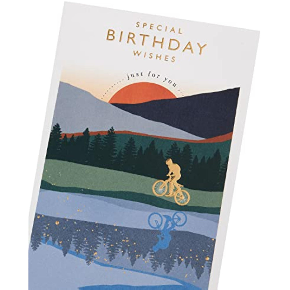UK Greetings cyclist and sunset birthday card, colorful illustration of a cyclist riding under a vibrant sunset scene.