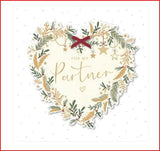 UK Greetings decorative heart partner Christmas card, featuring festive heart design and romantic message for loved ones.