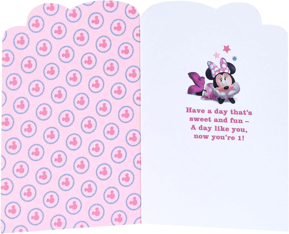 Pink Disney 1st birthday greeting card for girls featuring Minnie Mouse, with an envelope, by UK Greetings.