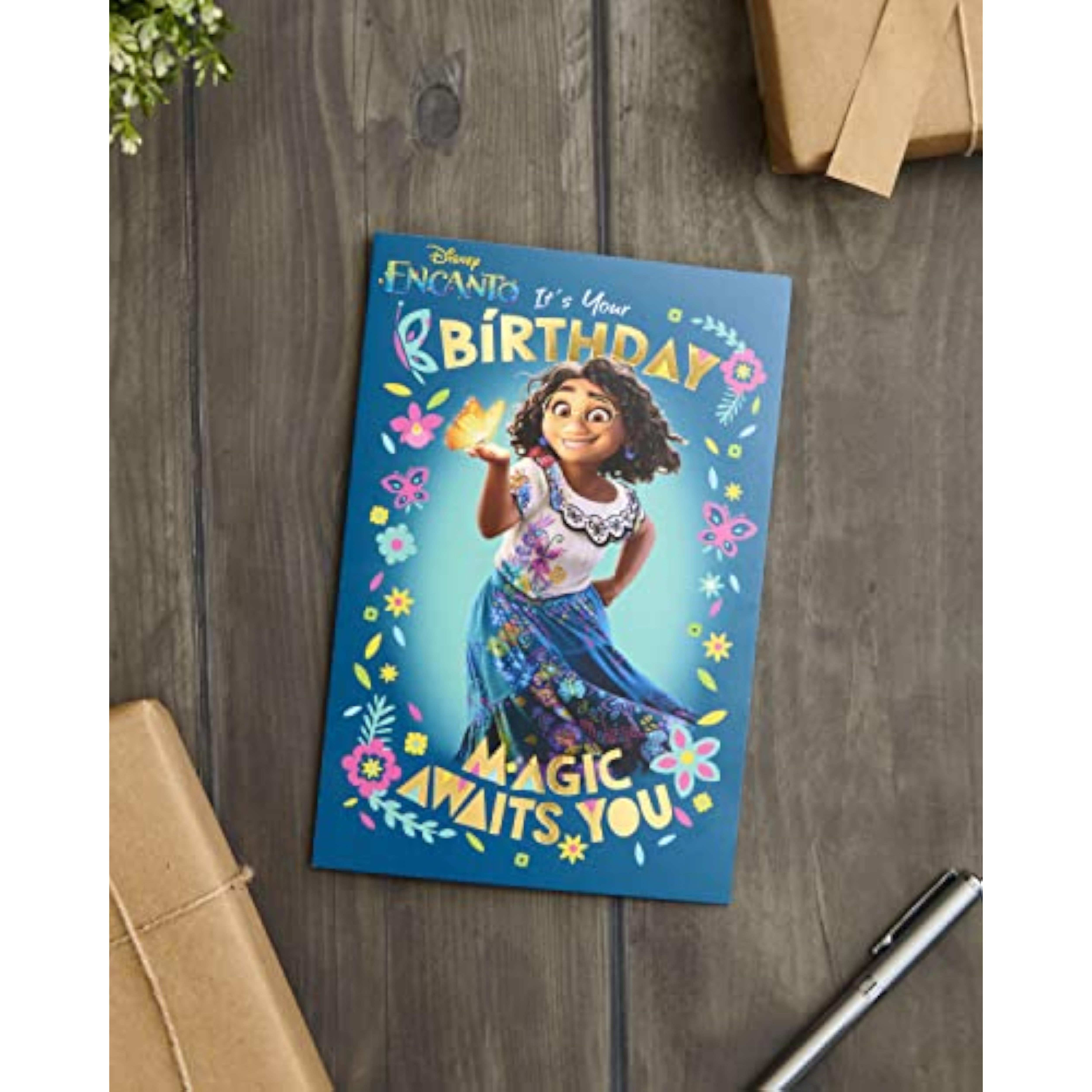 UK Greetings Disney Encanto birthday greeting card featuring colorful Encanto characters for celebrating birthdays.