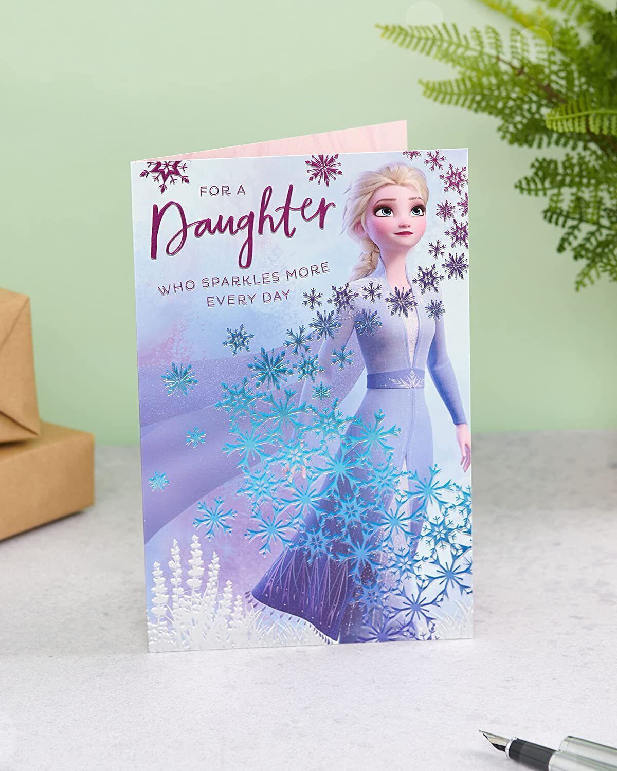 Disney Frozen 2 Elsa birthday greeting card for daughters by UK Greetings, featuring Elsa and winter-themed design.