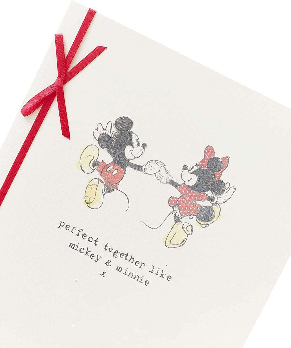 UK Greetings Disney Mickey and Minnie Mouse anniversary greeting card featuring colorful cartoon characters for celebrating special occasions.