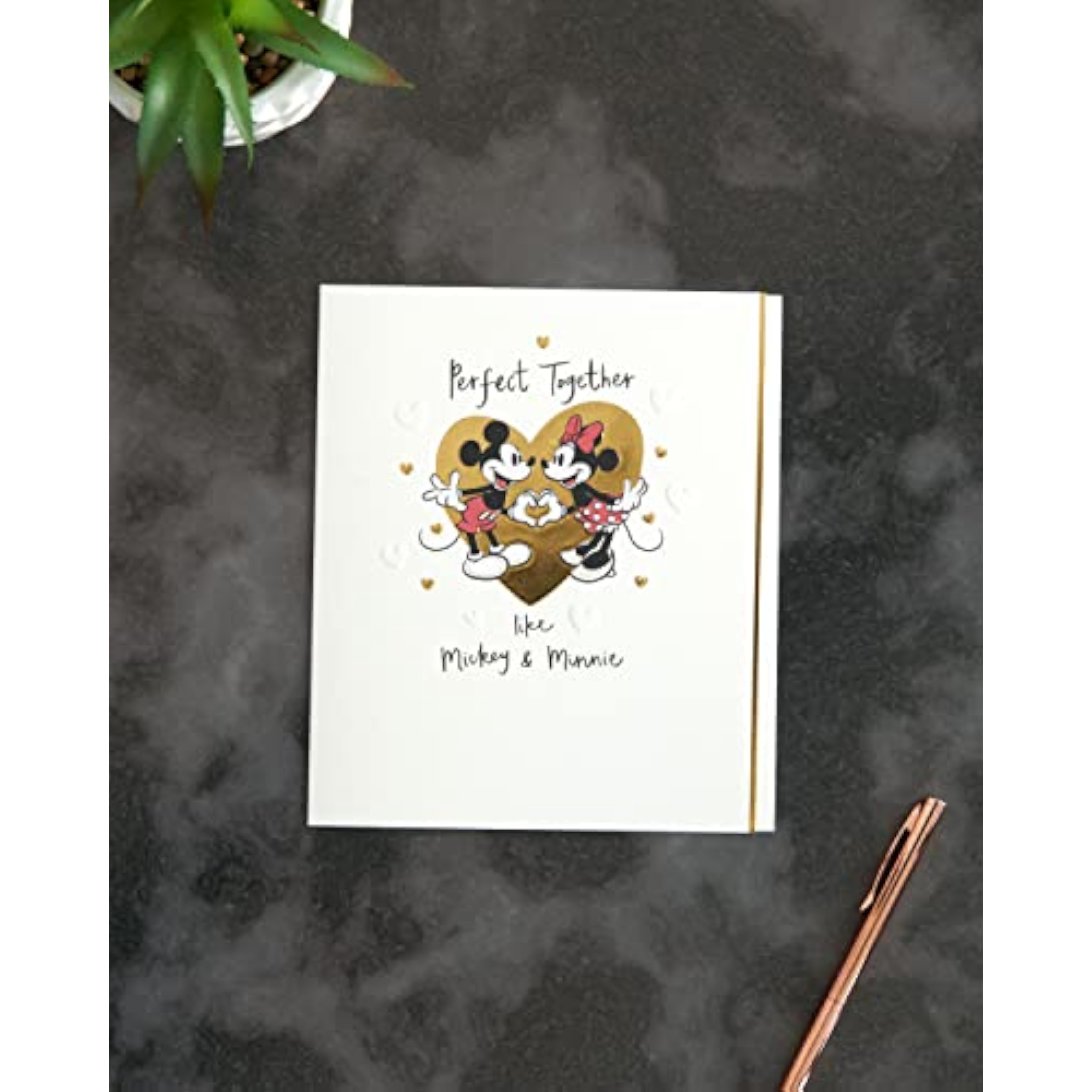 UK Greetings Disney Mickey & Minnie Mouse anniversary greeting card featuring colorful cartoon characters and festive design.