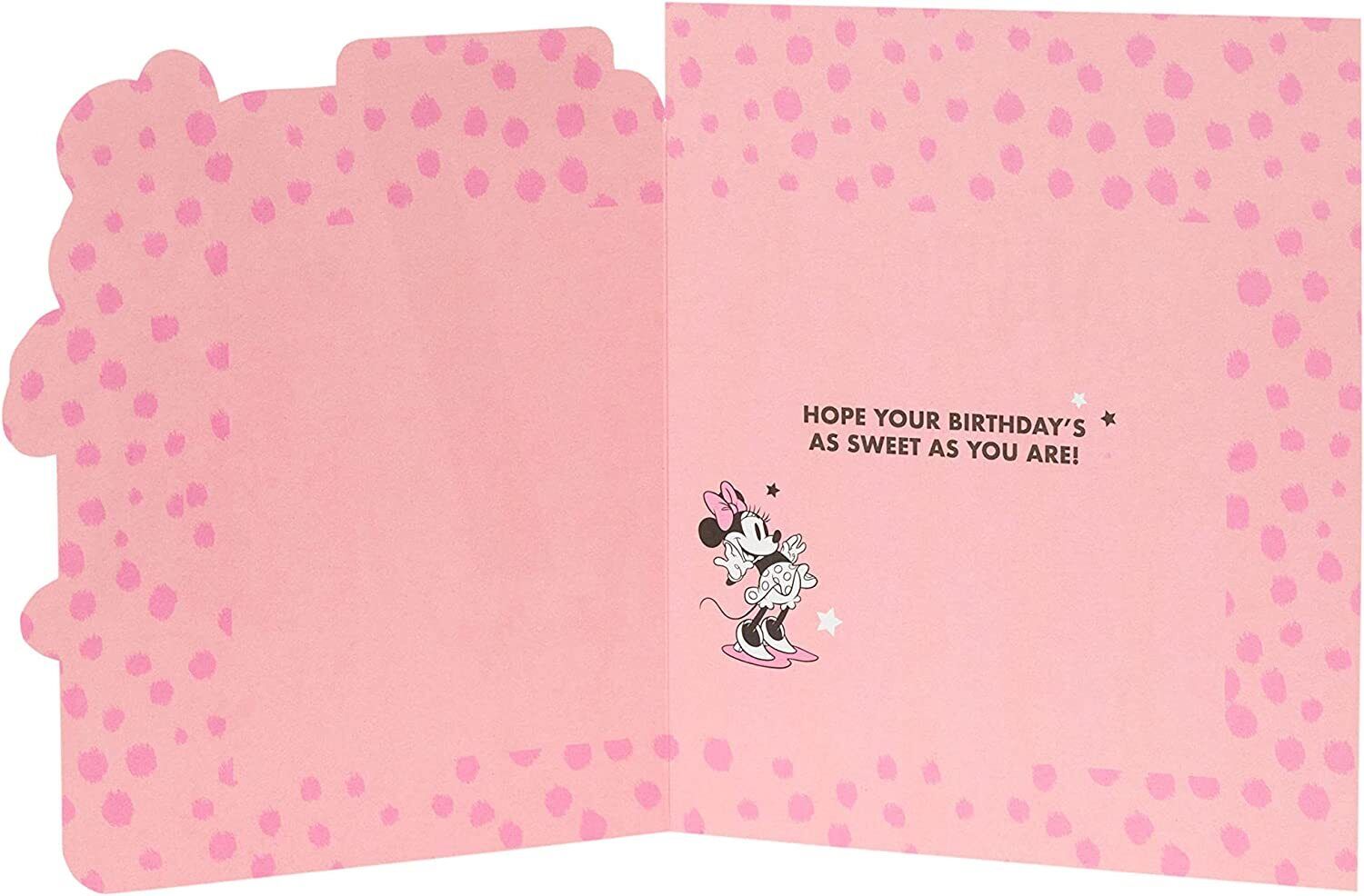 UK Greetings Disney Minnie Mouse birthday greeting card for age 7 featuring Minnie Mouse illustration and colorful design.