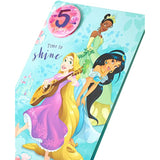 Disney Princess girls 5th birthday greeting card with badge from UK Greetings, featuring colorful princess illustrations.