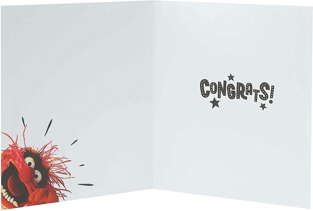 UK Greetings Disney Muppets congratulations card for passing exam, featuring colorful Muppet characters and cheerful design.