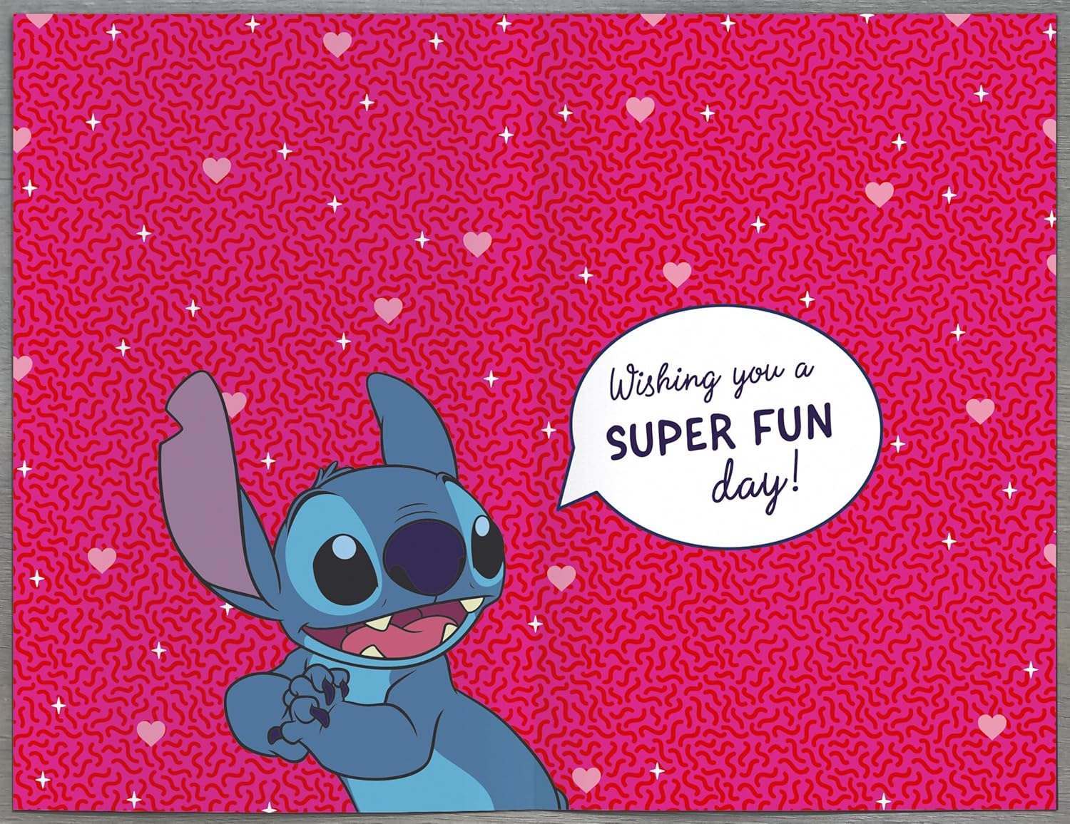Disney Stitch birthday greetings card for girls by UK Greetings, featuring luxury foil accents and a playful Stitch design.