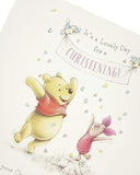 UK Greetings Disney Winnie the Pooh Christening Card featuring a cute Winnie the Pooh design on a greeting card for special occasions.