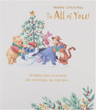 Disney Winnie the Pooh Christmas Card by UK Greetings featuring Pooh and friends in a festive holiday design.