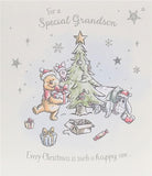 UK Greetings Disney Winnie the Pooh grandson Christmas card featuring Winnie the Pooh with holiday-themed design.