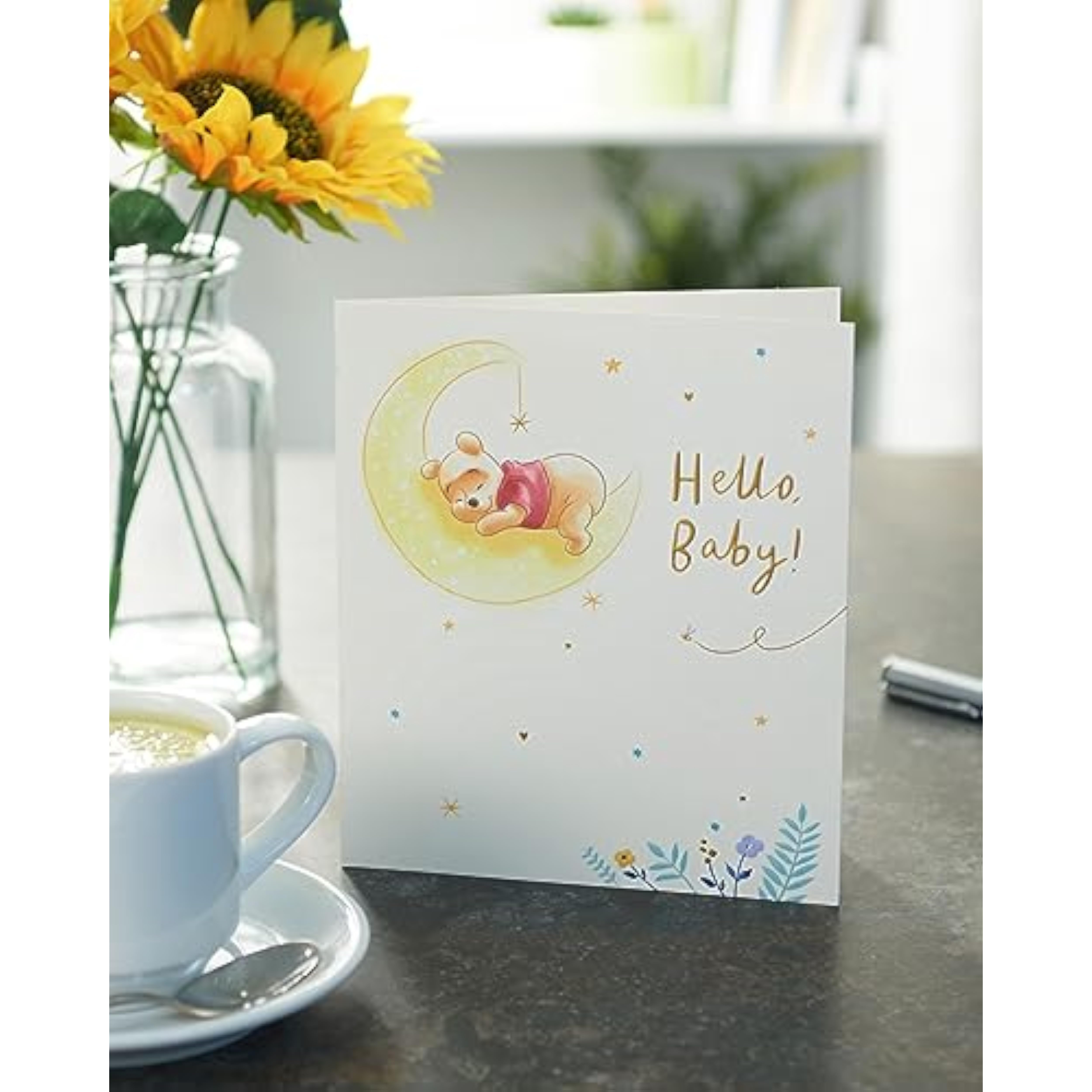 UK Greetings Disney Winnie the Pooh new baby greeting card featuring Winnie the Pooh and friends in soft pastel colors.