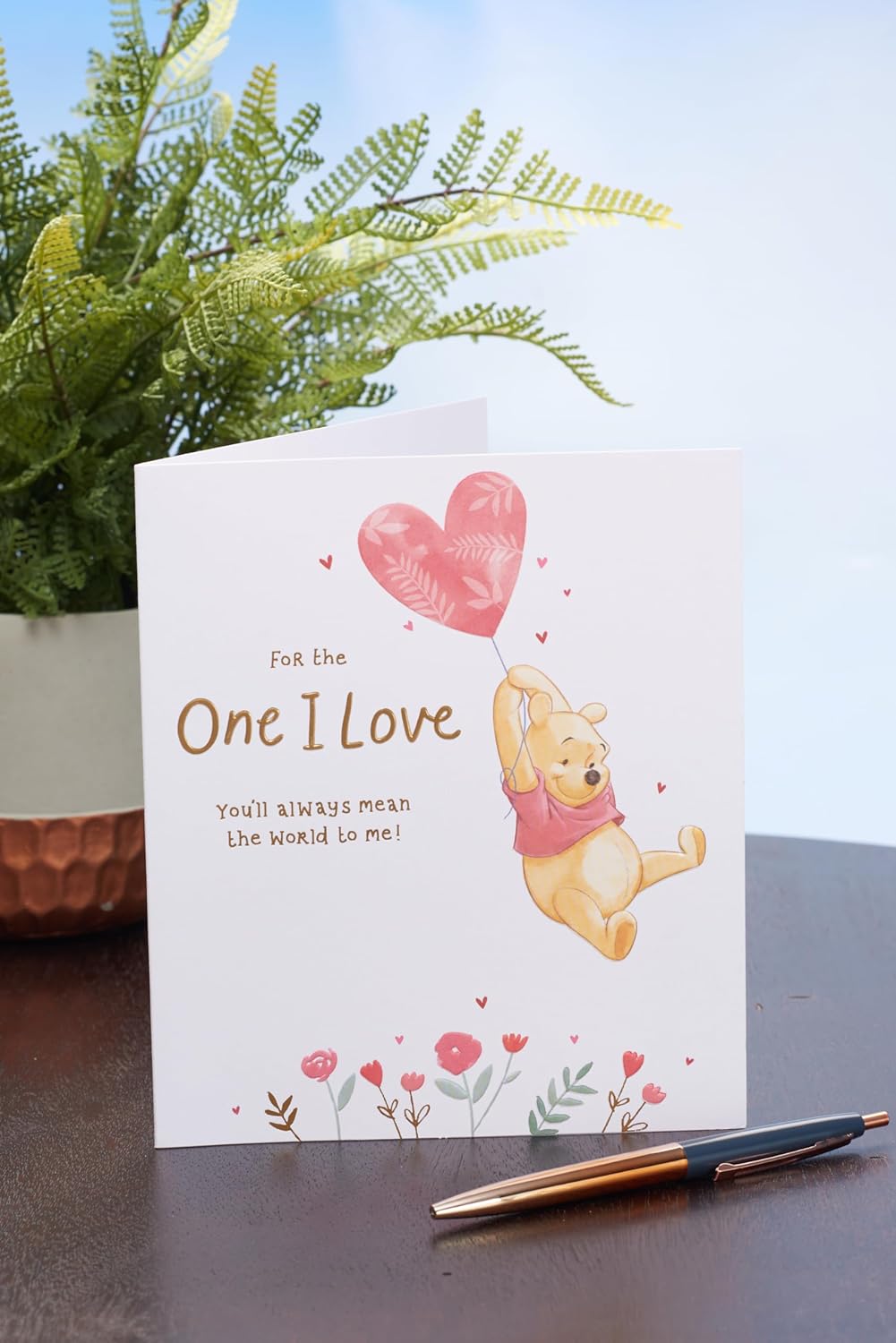 Disney Winnie the Pooh Valentine’s Day greeting card by UK Greetings featuring a One I Love balloon design.