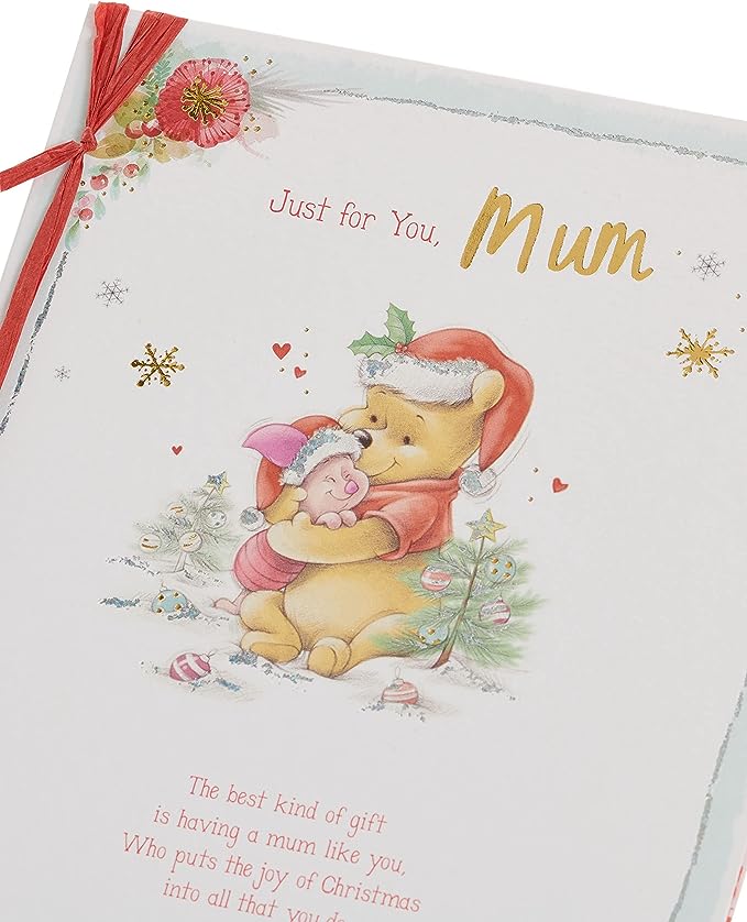 UK Greetings Disney Winnie the Pooh and Piglet Christmas greeting card featuring festive holiday illustrations.
