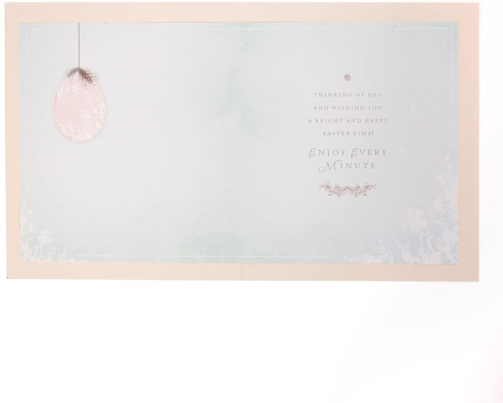 UK Greetings Easter Card featuring Easter wishes with love, decorated with colorful spring floral designs.