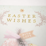 UK Greetings Easter Card featuring Easter wishes with love, decorated with colorful spring-themed designs and illustrations.