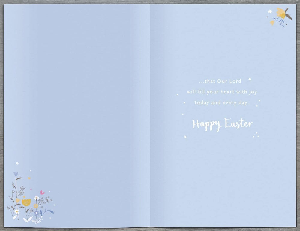 UK Greetings Easter greeting card featuring a silver cross and floral design for the Holy Season, perfect for Easter celebrations.