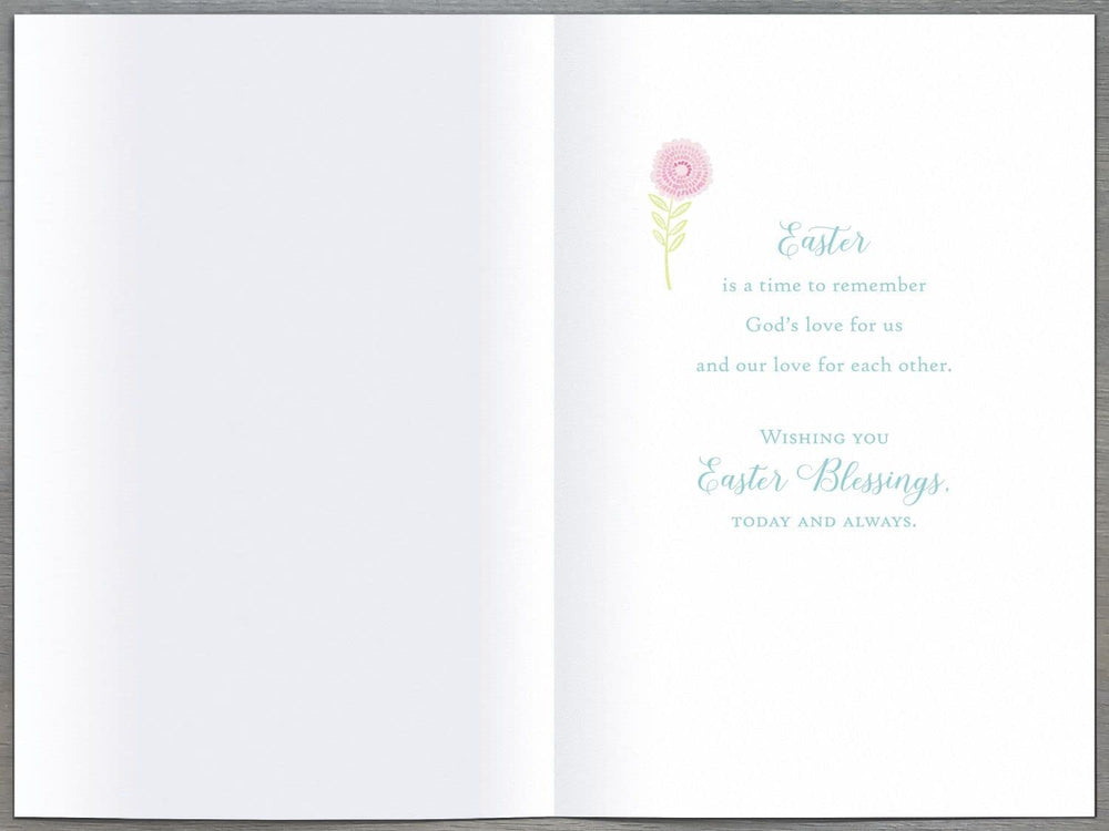 UK Greetings Easter Card featuring a cross and flowers with the message "The Lord Has Risen," decorative religious greeting card.