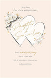 UK Greetings anniversary greeting card for daughter and son-in-law with romantic floral heart design and elegant style.