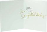 UK Greetings graduation card featuring elegant foil and embossed finish with decorative design and celebratory message.