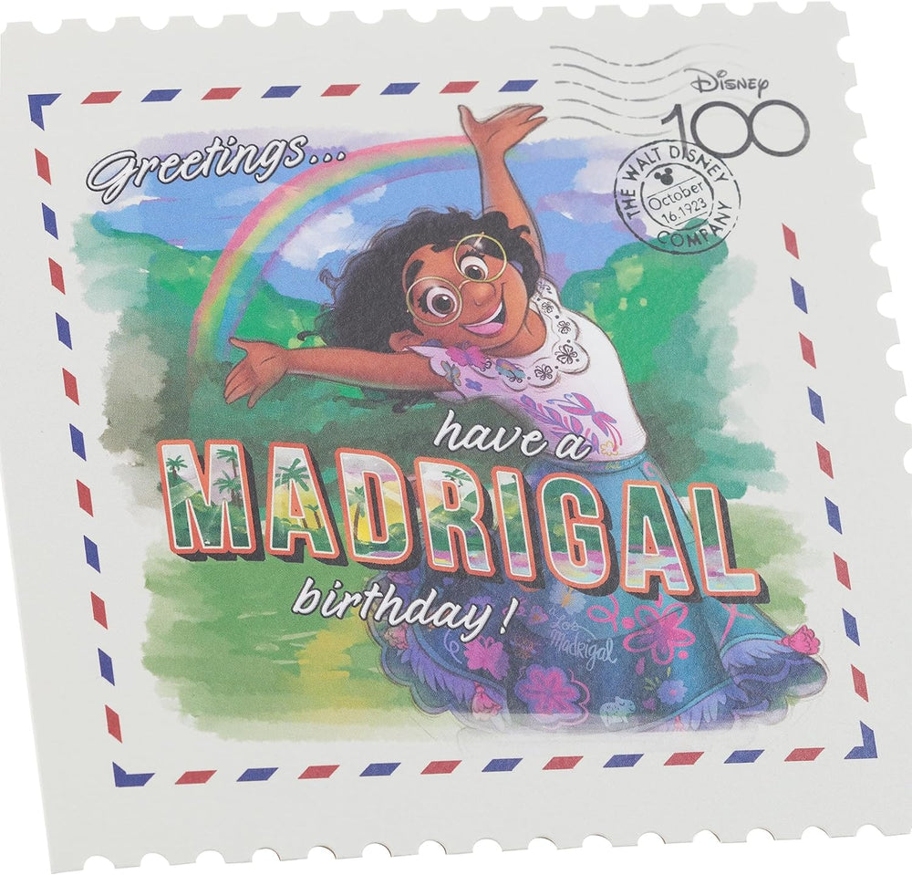 UK Greetings Encanto greeting card featuring Mirabel Disney 100 birthday stamp design displayed on a colorful card.