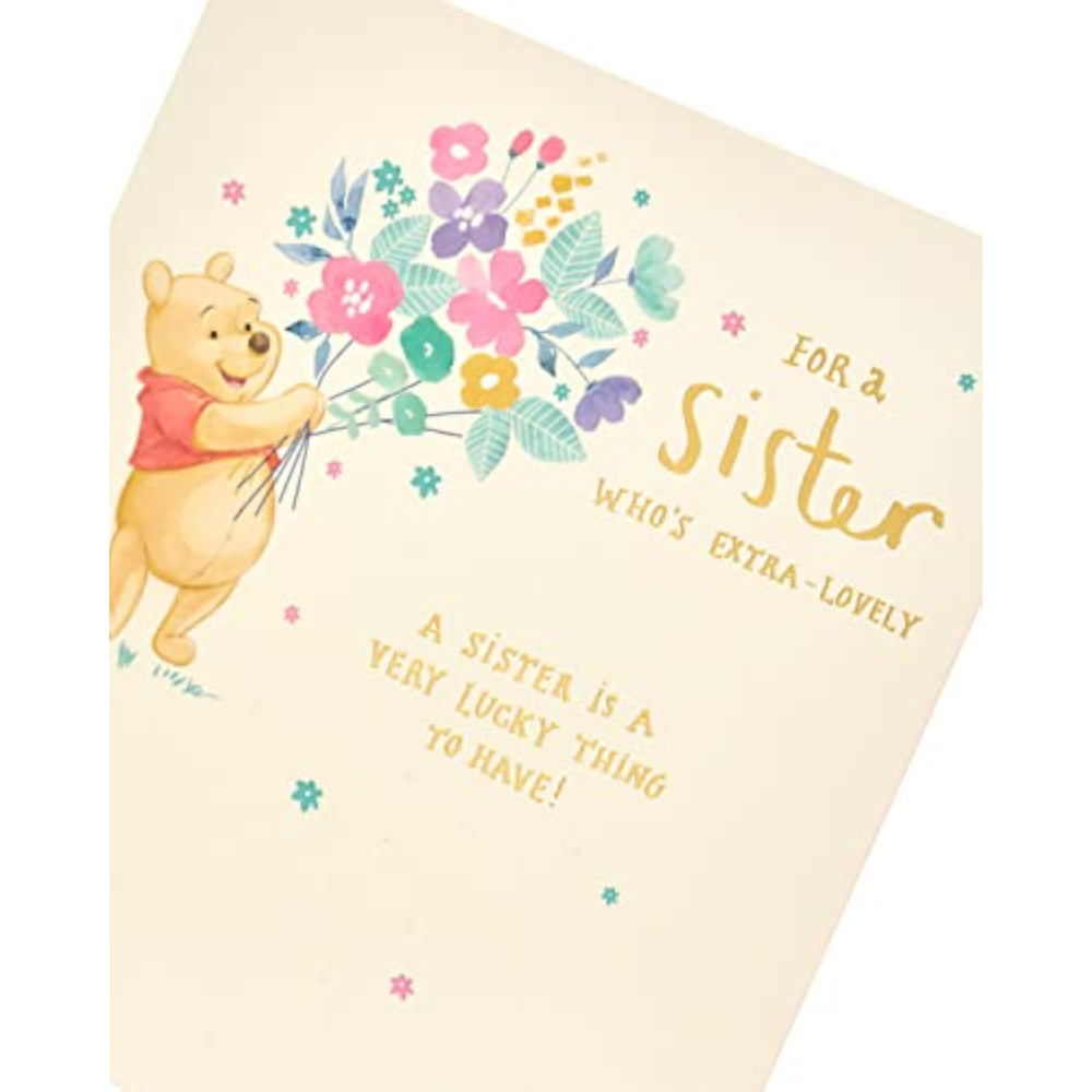 UK Greetings Disney Winnie the Pooh sister birthday card featuring flowers with cheerful, colorful illustrations.
