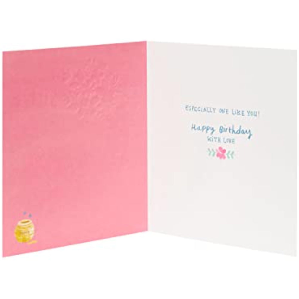 UK Greetings Winnie the Pooh birthday card featuring flowers, designed for sisters, with a charming Disney Winnie the Pooh illustration.
