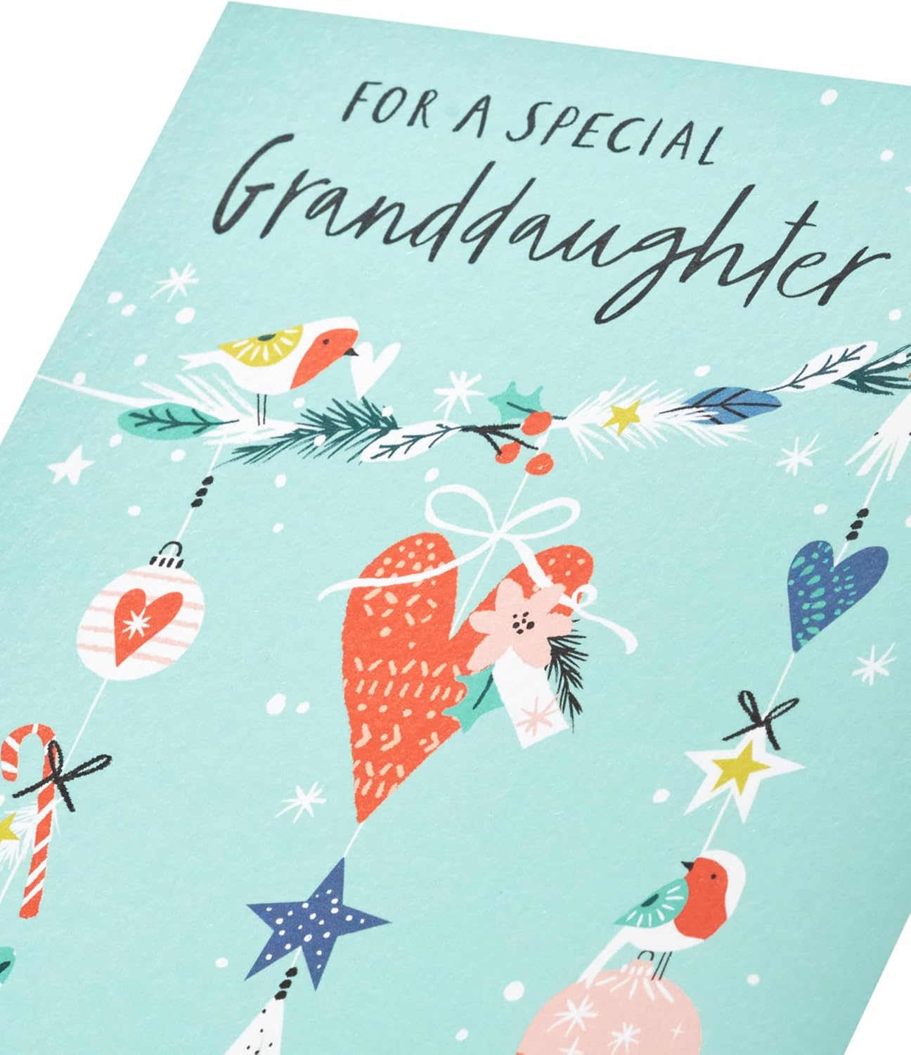 UK Greetings festive Christmas card featuring a colorful granddaughter-themed design with holiday decorations and cheerful imagery.