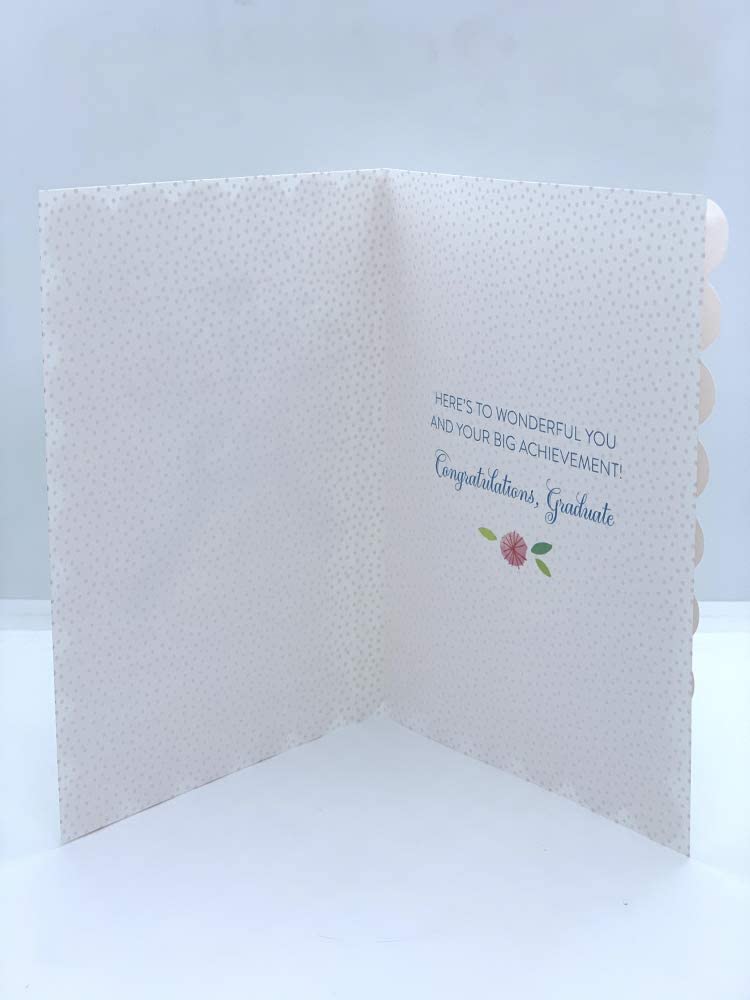 UK Greetings glitter and diamante graduation card featuring a girl with flowers, decorative and festive greeting card design.