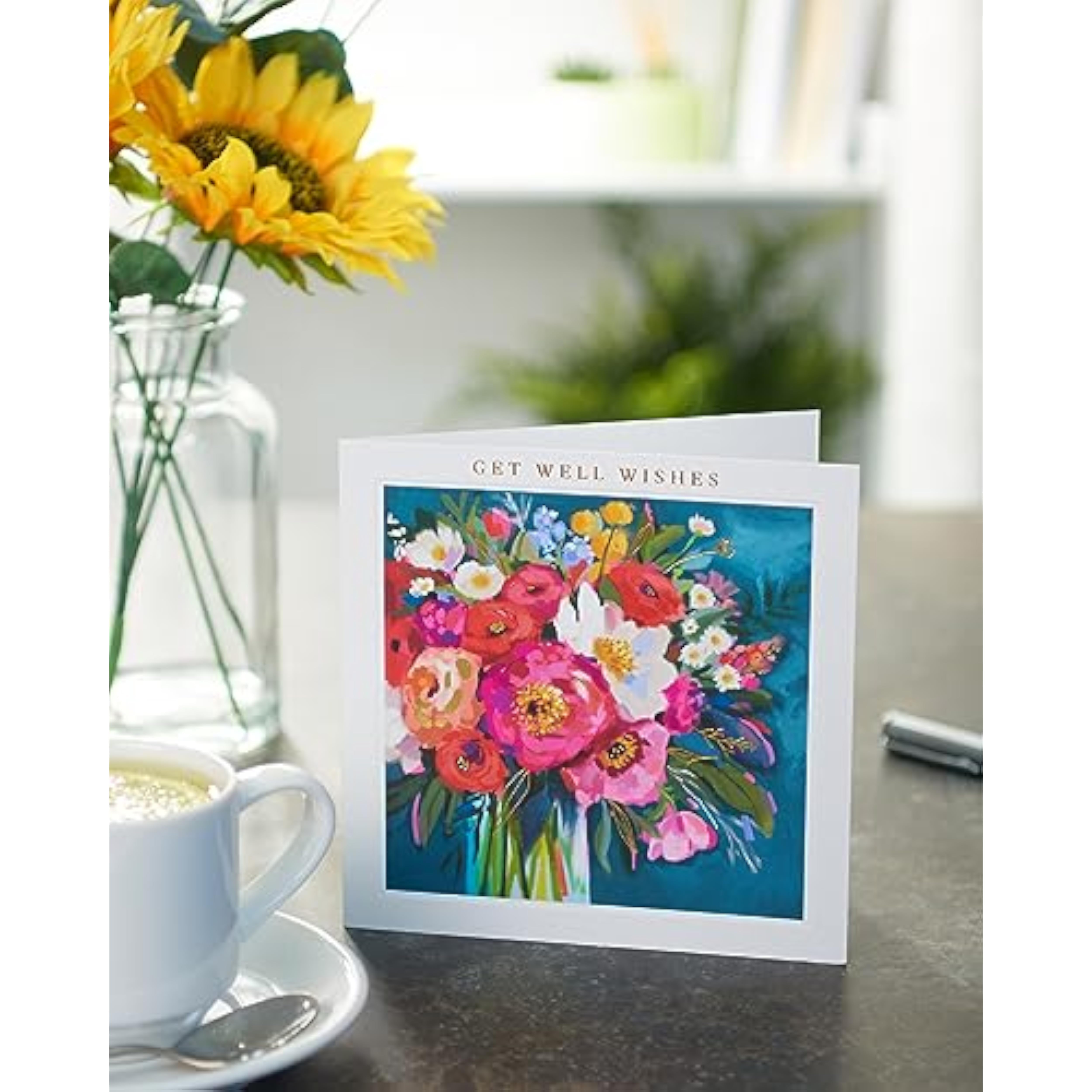 UK Greetings floral painted get well soon card featuring colorful flower design, perfect for sending warm wishes.
