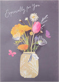 UK Greetings flower in jar birthday card with colorful floral design and cheerful message, perfect for celebrating special occasions.