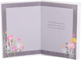 UK Greetings flower in jar birthday card featuring a colorful floral design and heartfelt message on the front.