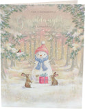 UK Greetings Christmas card featuring a snowman design, perfect for a wonderful granddaughter during the holiday season.