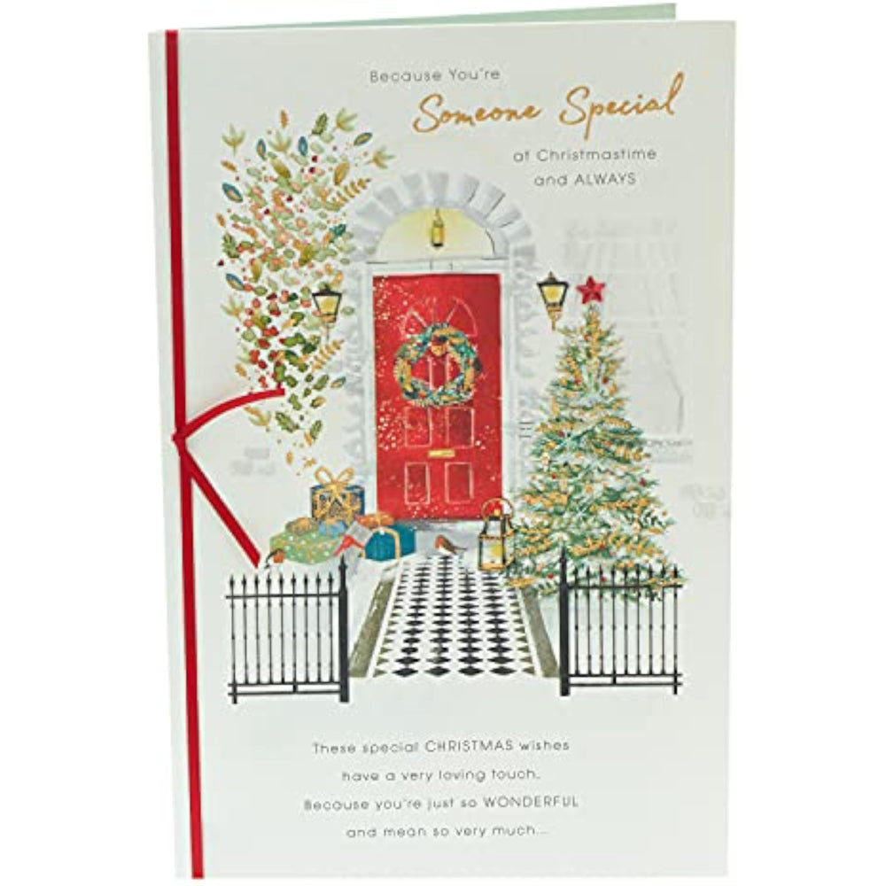 UK Greetings Christmas card featuring a front door scene with a "Someone Special" message, holiday greeting card design.