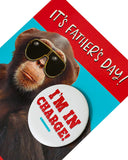 UK Greetings Funny Chimp Badge Father's Day Card featuring a humorous chimp illustration on a greeting card.