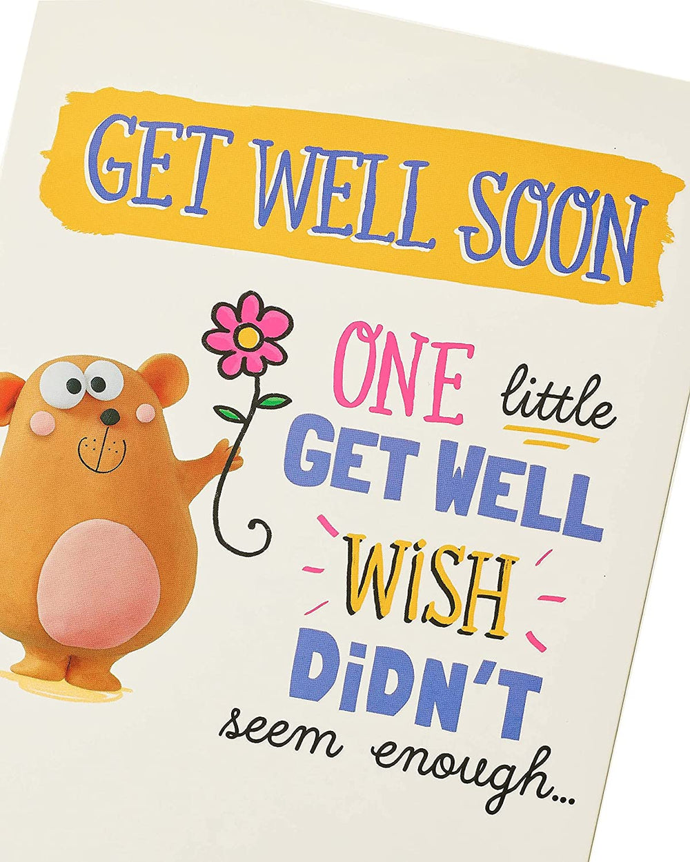 UK Greetings Get Well Soon greeting card featuring a humorous pop-up bear holding a bunch of flowers.